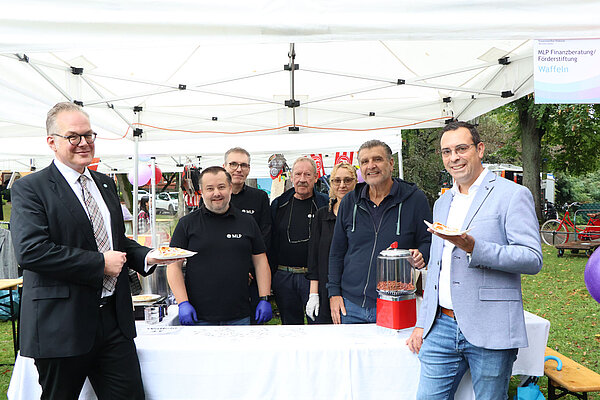Gruppenbild am MLP-Stand